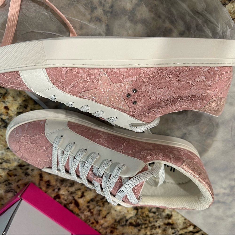 New in original box and never been worn. Supernova pink lace sneakers.